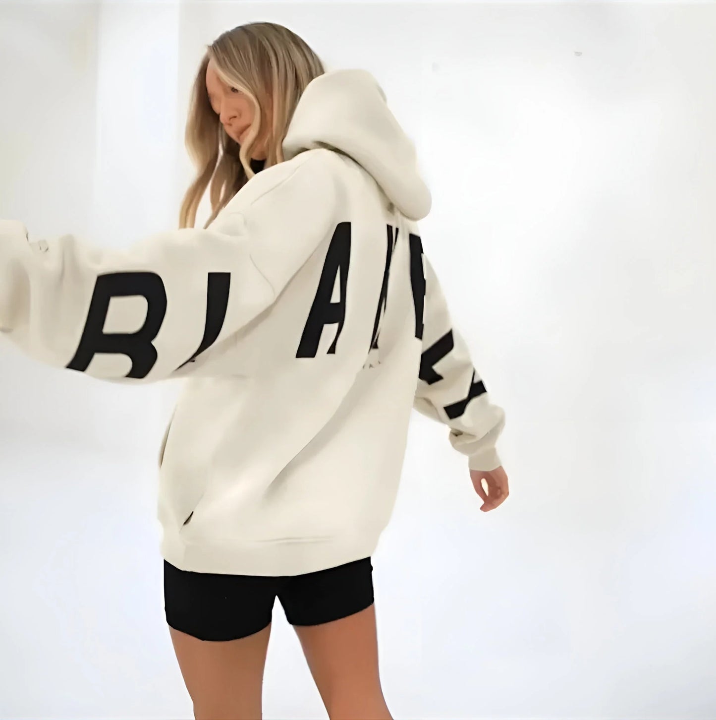 SUDADERA OVERSIZE CON CAPUCHA Y ESTAMPADO GRÁFICO TRASERO - Ada Cepeda Shop