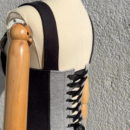 SUDADERA GRIS CON CUELLO ALTO Y TOP CORSET INCORPORADO - Ada Cepeda Shop